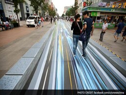This Amazing 3D Street Art is Stopping Beijing in Its Tracks This Amazing 3D Street Art is Stopping Beijing in Its Tracks