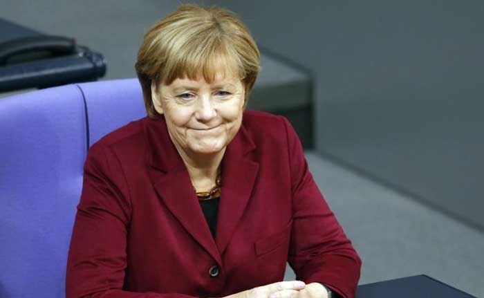 Angela Merkel Sees 'Glimmer Of Hope' in Ukraine, But Russia Sanctions Remain