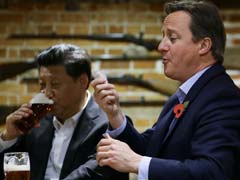 David Cameron Takes Xi Jinping to the Pub for Fish and Chips