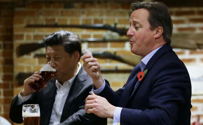 David Cameron Takes Xi Jinping to the Pub for Fish and Chips