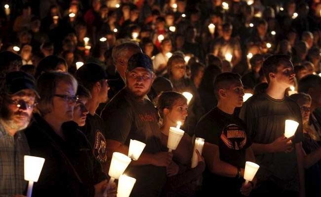 Oregon Town Residents Seek Solace in Church After College Massacre
