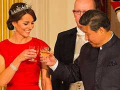 Kate Middleton's Red Dress Wins Over China as Cameron Cheer Hides Disquiet