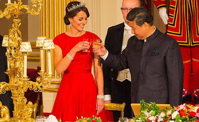 Kate Middleton's Red Dress Wins Over China as Cameron Cheer Hides Disquiet