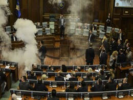 Lawmakers Stage Tear Gas Protest in Kosovo Parliament Lawmakers Stage Tear Gas Protest in Kosovo Parliament