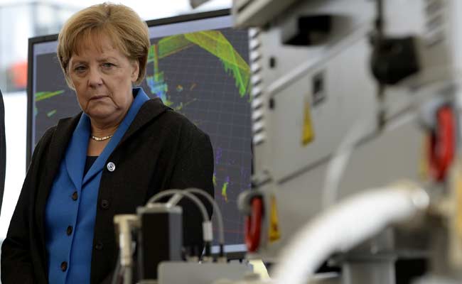 German Refugee Policy Row Raises Political Heat on Angela Merkel