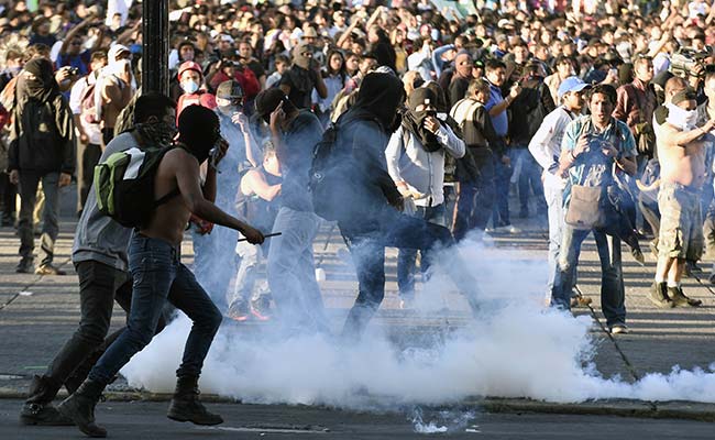 Clashes After Mexico City Massacre Protest