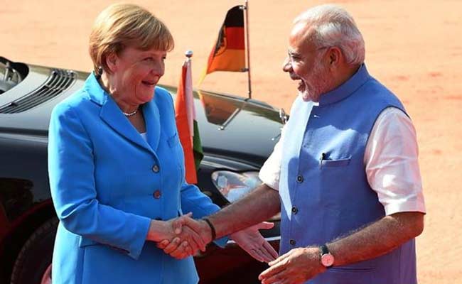 PM Modi and Angela Merkel's Blue Jackets Take Twitter by Storm