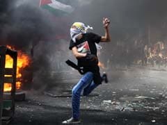 Israeli Strike Kills 2 Palestinians in Gaza as Unrest Spirals