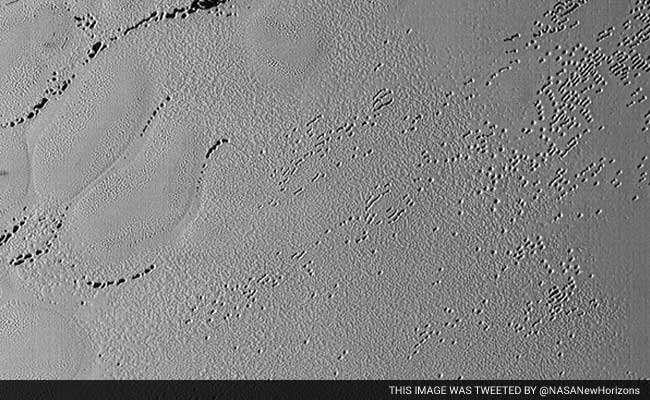 New Image Shows Pluto's Puzzling Patterns, Pits