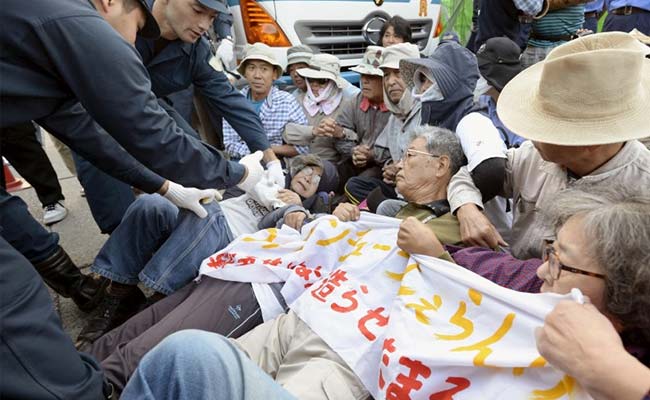 Japanese Protesters Dragged Away as Work Resumes at US Airbase