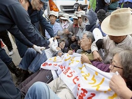 Japanese Protesters Dragged Away as Work Resumes at US Airbase Japanese Protesters Dragged Away as Work Resumes at US Airbase