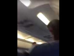 'Shame on American!' Airline Booed After Weeping Woman is Thrown Off a Flight