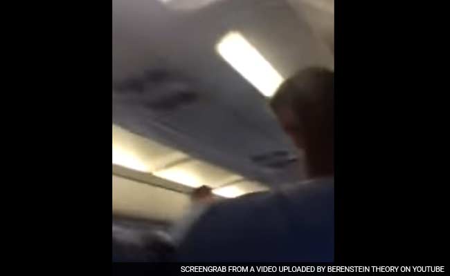 'Shame on American!' Airline Booed After Weeping Woman is Thrown Off a Flight