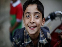 Between Devil and Deep Blue Sea: Syrian Children in Turkey Between Devil and Deep Blue Sea: Syrian Children in Turkey