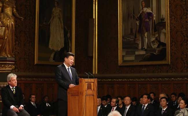 Welcomed With Pageantry and Protests, China's Xi Jinping Hails 'Bright' Ties Britain