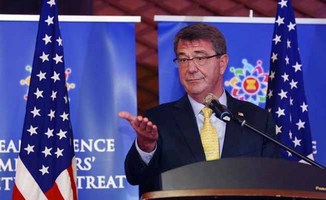 US Flexes Muscle, Pentagon Chief Visits Ship in South China Sea