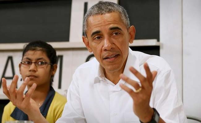 Barack Obama Visits Asian Refugee Center Amid Raging Debate in US