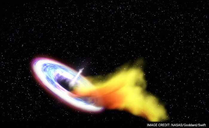 Scientists Just Caught Black Hole Swallowing Star - And Burping A Bit Back Out