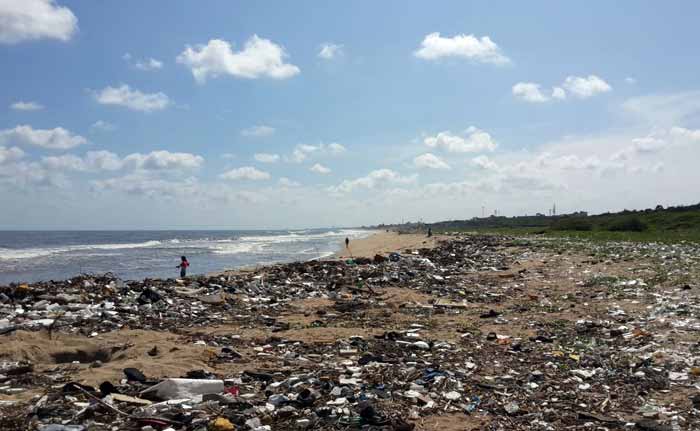 Heavy Rains Flood Chennai Beaches With Garbage