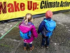 Climate Talks Run Overtime to Reach Deal Amid Differences