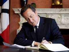 UK Prime Minister Signs Paris Attacks Book of Condolences