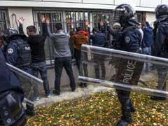 Kosovo Police Arrest 13, Fire Tear Gas in Protest Clashes