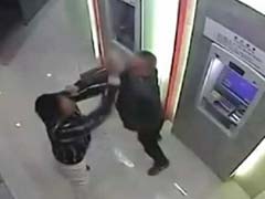 Watch: Chinese Man Beats "Robber" Blue at an ATM Machine