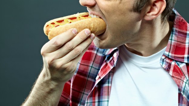 Modern Men tend to Overeat Like Cavemen as a Way of Showing off to Women