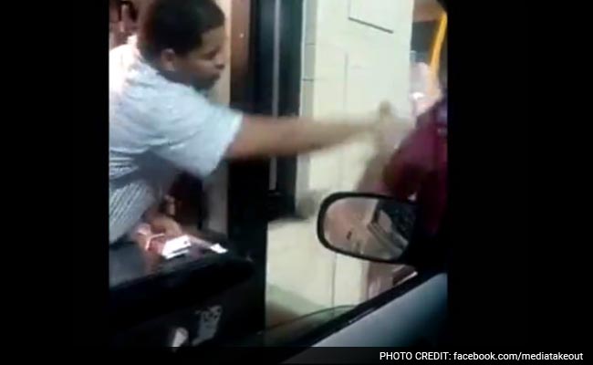 Video Shows McDonald's Worker Taunt Homeless Man, Throw Water in His Face