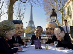 World Leaders Break French Bread as They Gather to Save Humanity