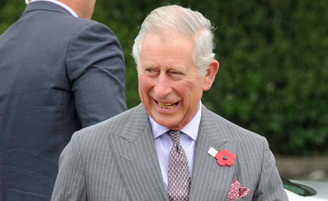 Kiwi Royal Fan Plants a Cheeky Kiss on Prince Charles