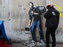 Banksy's Striking New Mural Imagines Steve Jobs As A Syrian Refugee