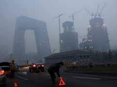 Thousands Of Plants Cut Production As Beijing Smog Persists