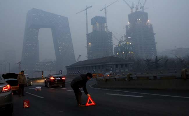 Blue Skies Return To Beijing As Wind Clears Dangerous Pollution
