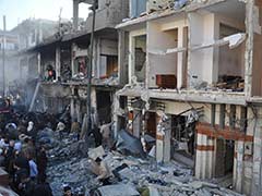 Bombs In Syria's Homs Kill 32, Wound 90: Reports