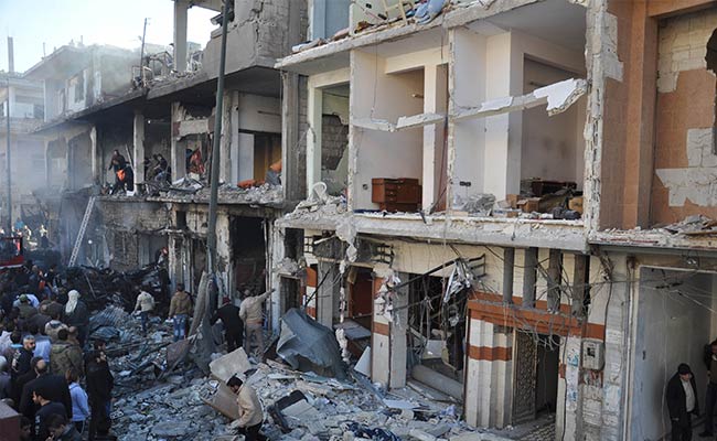 Bombs In Syria's Homs Kill 32, Wound 90: Reports