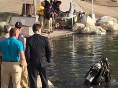 Divers Search Lake For Evidence In Southern California Massacre