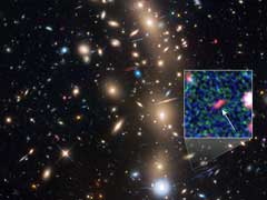 Astronomers Spot Faintest Galaxy From the Early Universe