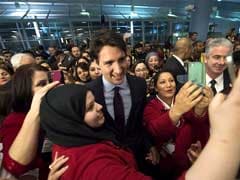 'Welcome Home,' Justin Trudeau Greets Refugees As Plane Arrives In Canada