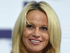 Pamela Anderson Visits Kremlin To Lobby For Animal Protection