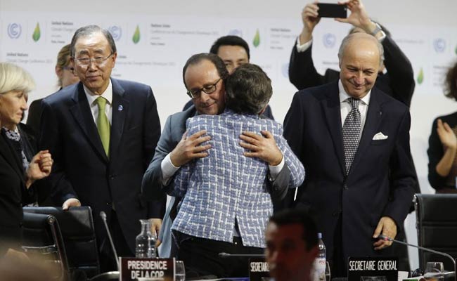 Tears, Cheers And Selfies As Climate Pact Sealed In Paris