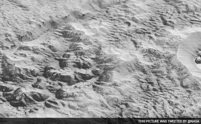 NASA Probe Beams Sharpest Ever Images of Pluto