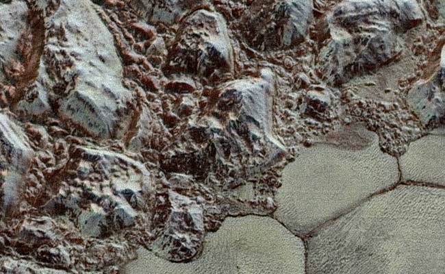 See Mesmerising Pluto in Colour Now