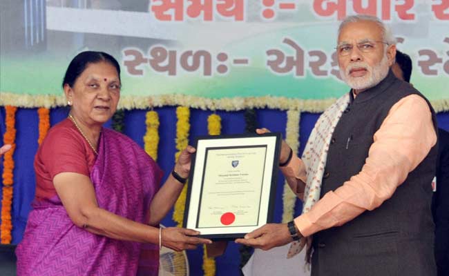 PM Hands Over Shyamji Verma's Reinstatement Certificate To Anandiben Patel