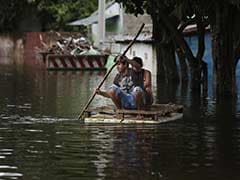 Floods Force Thousands Into Shelters In South America