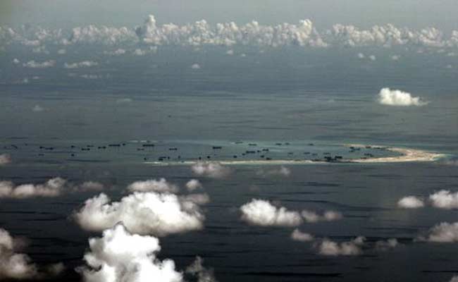 China Confirms 'Weapons' On Disputed Island In South China Sea
