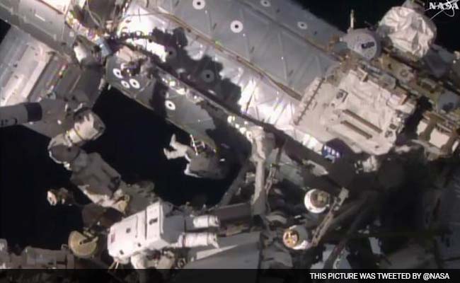 US Astronauts Begin Spacewalk To Fix Stalled Rail Car
