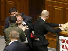 Ukraine Lawmaker Manhandles Prime Minister In Rowdy Parliament Scenes