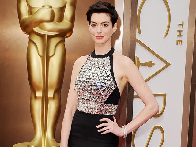 Anne Hathaway Shares Image of Her Baby Bump in a Bikini