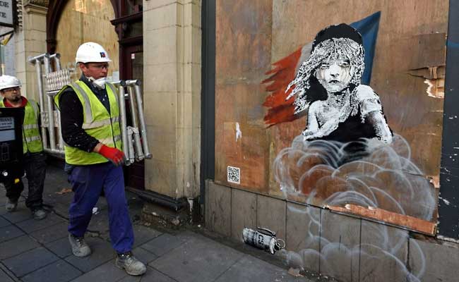 London Builders Cover Up Banksy Mural Against France